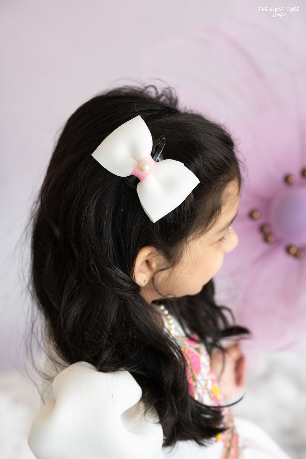 White bow hair accessory