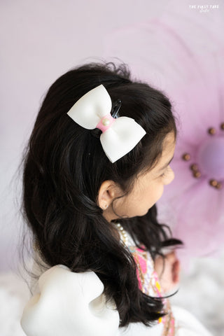 White bow hair accessory