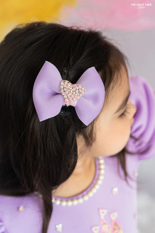 Lavender bow hair accessory